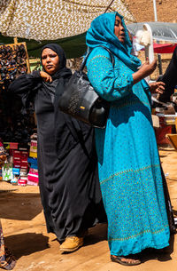 Portrait of a couple standing outdoors