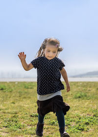 Full length of woman standing on land