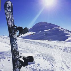 Scenic view of snow covered mountain against clear sky