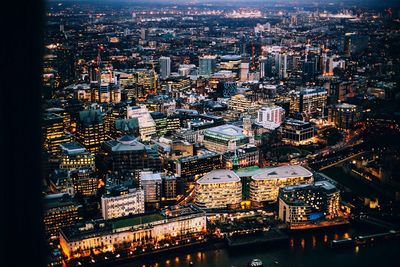 Aerial view of illuminated cityscape at night