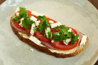 Close-up of pizza served in plate