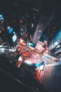 High angle view of illuminated cityscape at night