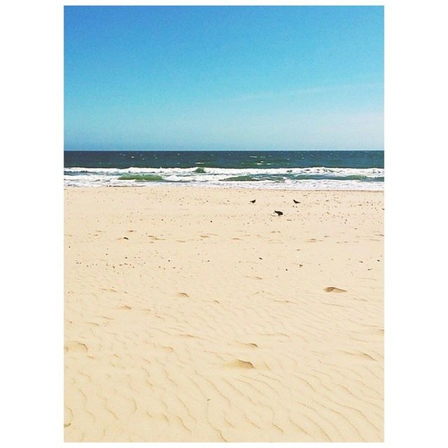 transfer print, sea, horizon over water, auto post production filter, beach, clear sky, water, sand, shore, copy space, tranquil scene, tranquility, scenics, beauty in nature, blue, nature, sky, idyllic, day, outdoors