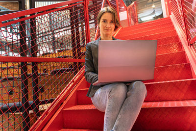 Young woman using mobile phone