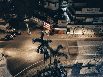 High angle view of text by building at night