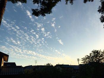 High section of houses against blue sky