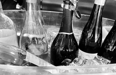 Close-up of glass bottles on table