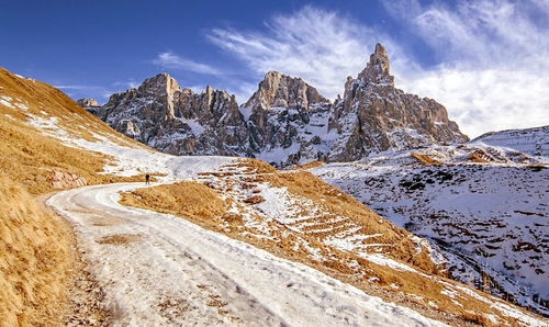 View of snow covered mountain against cloudy sky