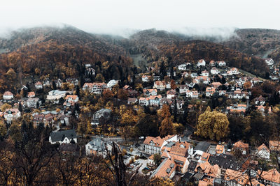 High angle view of townscape and trees in city