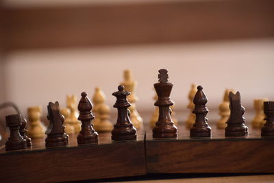 Close-up of chess pieces on board