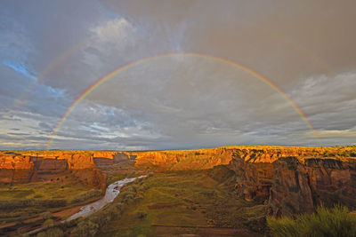 Double rainbow at sunset over canyon de chelly in arizona