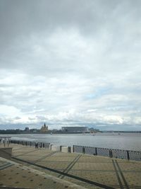 Pier over sea against sky