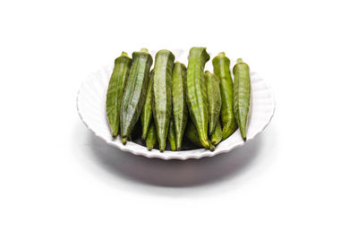 High angle view of vegetables against white background