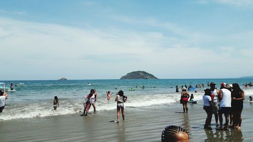 People enjoying at beach