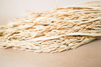 Close-up of wheat on table