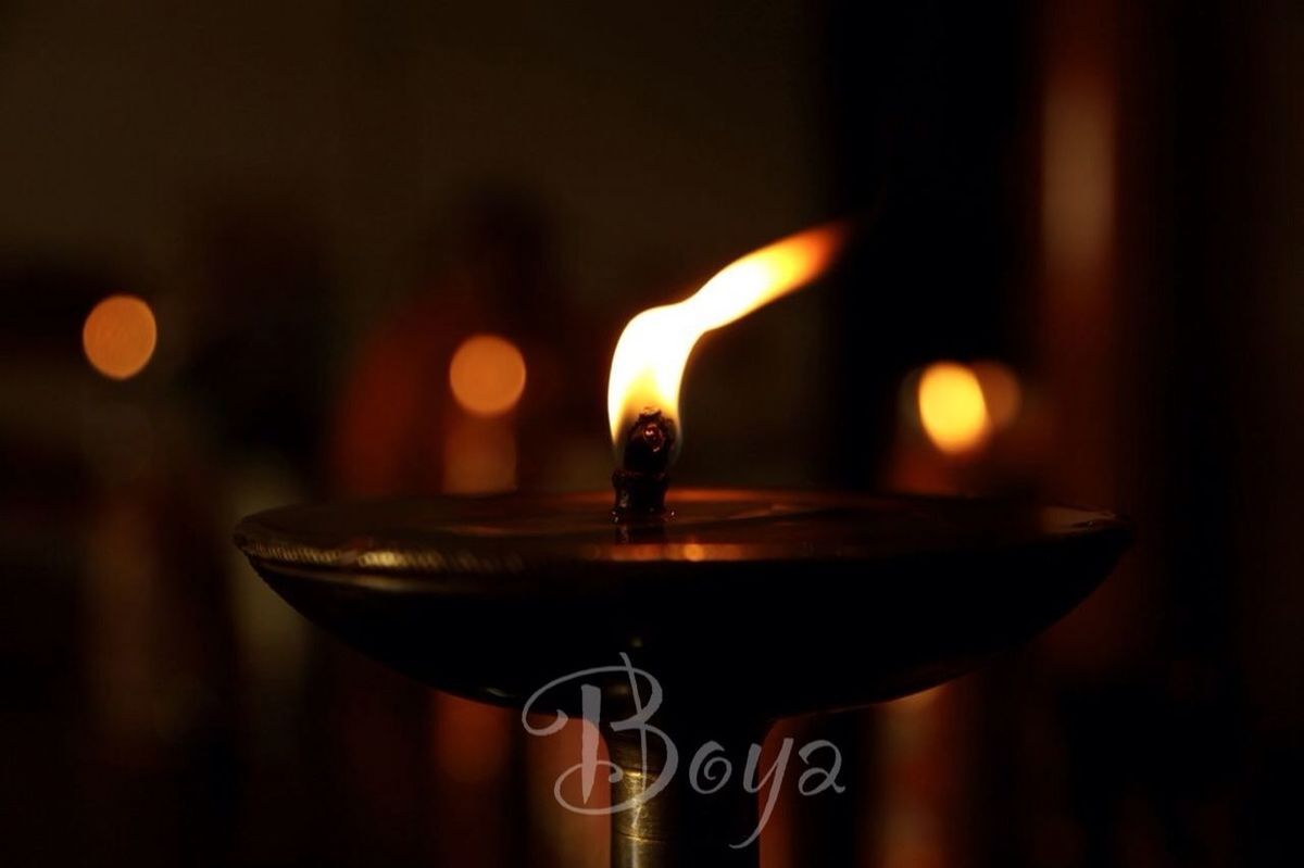 illuminated, flame, focus on foreground, burning, close-up, night, glowing, fire - natural phenomenon, candle, heat - temperature, selective focus, lit, lighting equipment, light - natural phenomenon, fire, no people, orange color, single object, indoors