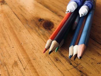 High angle view of colored pencils on table