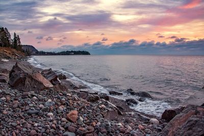 Scenic view of sea against sky during sunset