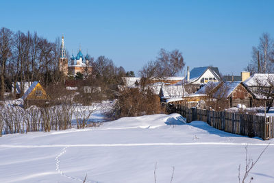 Village of dunilovo, ivanovo region on a sunny winter day, russia.