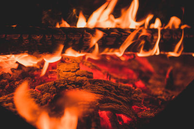 Close-up of fire burning at night
