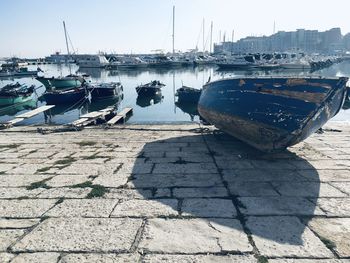 Boats moored at harbor