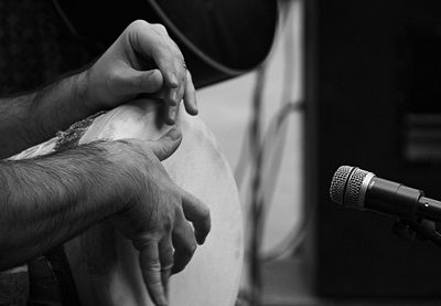 Close-up of man hand with percussion instrument