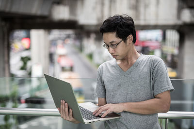 Young man using mobile phone