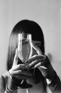 Portrait of woman holding beer glass