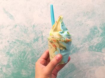 Cropped image of person holding hands