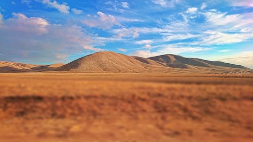 Scenic view of desert against sky