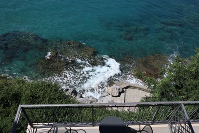 High angle view of swimming pool by sea