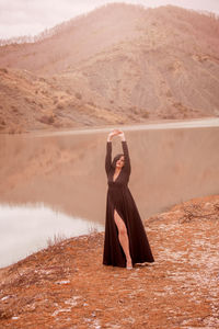 Woman standing in desert