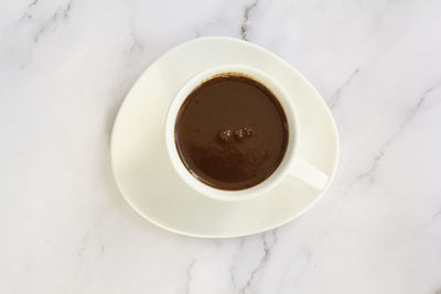 High angle view of coffee on table