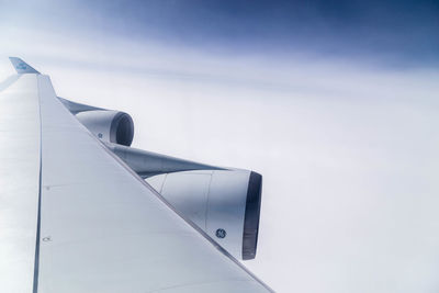 Airplane flying against sky