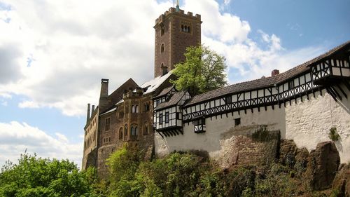 Low angle view of old ruins against sky