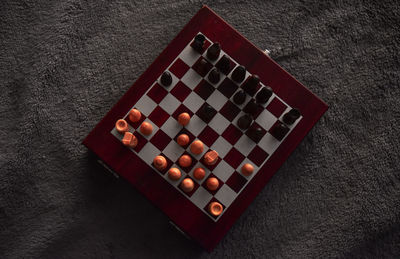 High angle view of chess on table