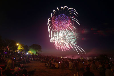 Firework display at night