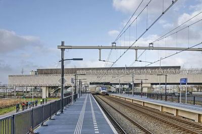 Various modes of transport, bicycle, train, highway, meet at the lansingerland railway station