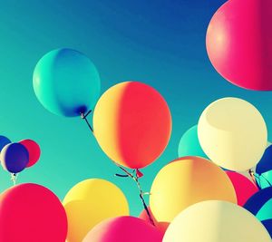 Low angle view of colorful balloons