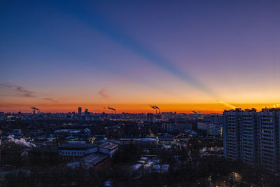 High angle view of townscape against sky during sunset