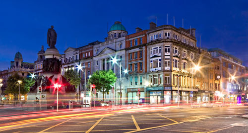 Light trails on city street at night