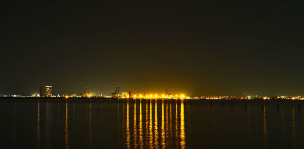 View of illuminated bridge at night