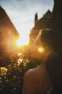 Portrait of woman against sky during sunset