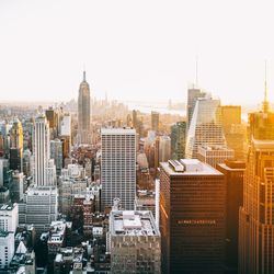 Skyscrapers in city against clear sky