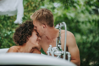 Young couple kissing outdoors