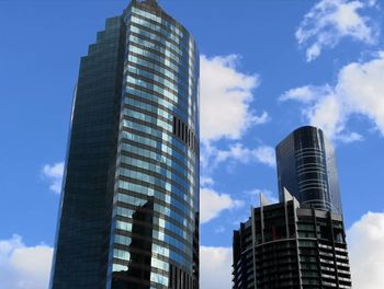 Low angle view of modern buildings against sky