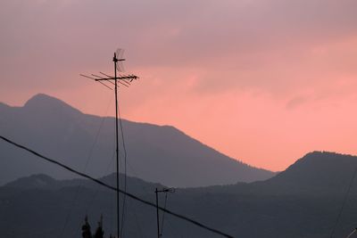 Low angle view of silhouette mountain against sky during sunset