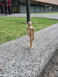 Young man walking on road