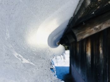 Close-up of icicles on metal during winter