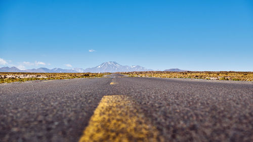 Surface level shot of country road against sky